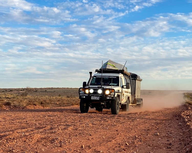 4-Outback-Corrugations-Dirt-Road-LandCruiser-Boat-On-Roof-Towing-OCA