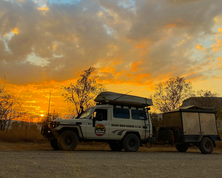 5-Outback-Cleanups-Australia-Sunset-LandCruiser-Towing-Boat-On-Roof